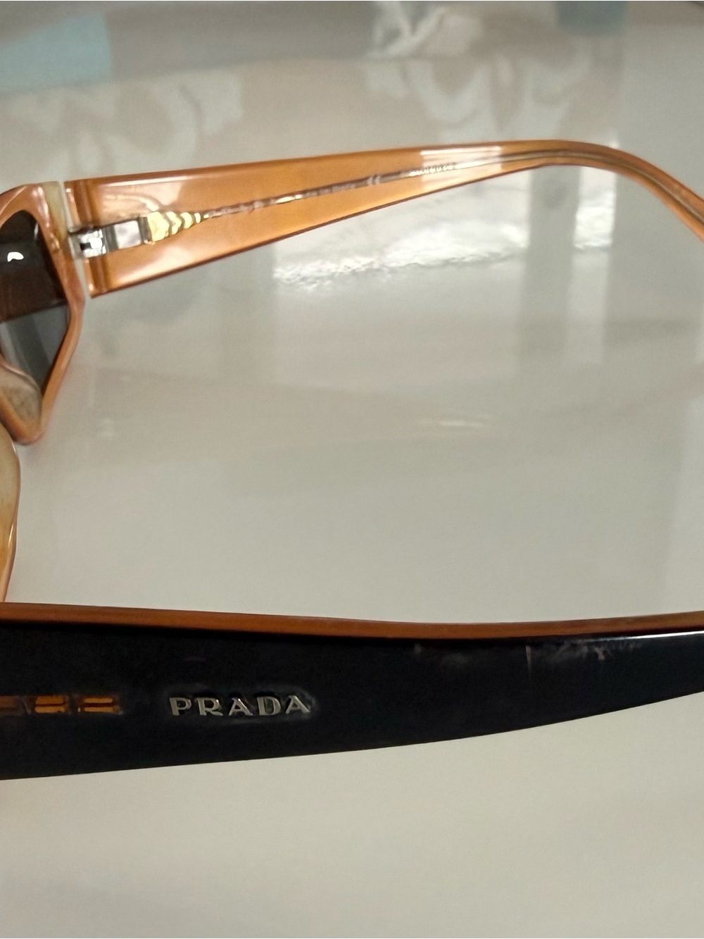 Authentic Prada Sunglasses - black & orange Frame with new replacement lens